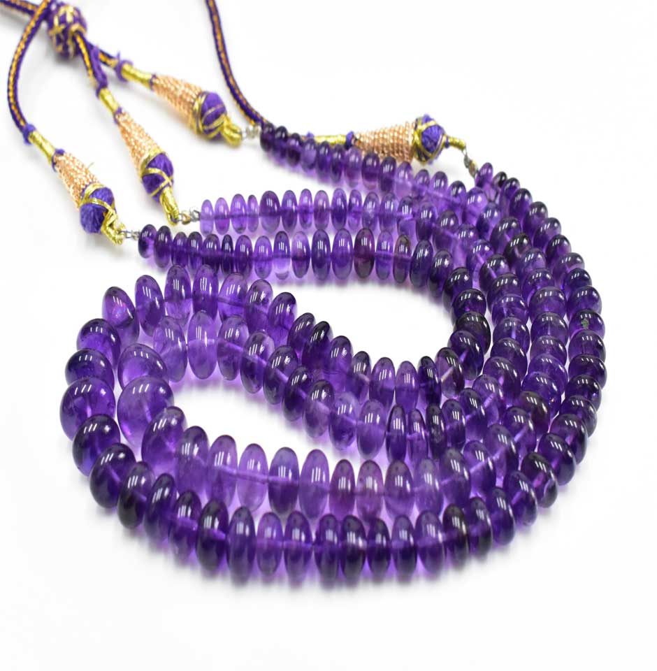 african_roundel_amethyst_beadsleft_1664347698